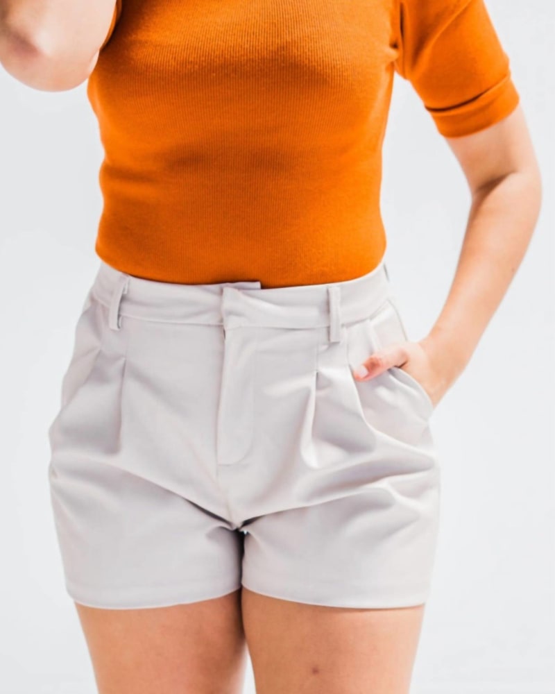 Front of a model wearing a size Large Play It Cool Leather Shorts In Ecru in Ecru by ENSEMBLE. | dia_product_style_image_id:347620
